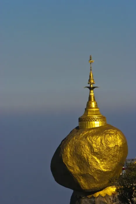 Framed Print : Myanmar, Burma, Golden Rock, Kyaiktiyo. The Golden Rock boulder balanced precariously on the edge of Framed Print : Myanmar, Burma, Golden Rock, Kyaiktiyo. The Golden Rock boulder balanced precariously on the edge of