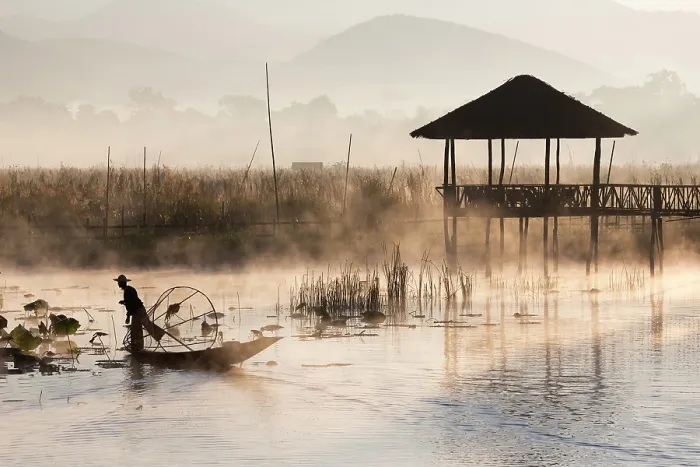 Framed Print : Myanmar, Burma, Shan, Fisherman in dugout canoe on Inle Lake at dawn Framed Print : Myanmar, Burma, Shan, Fisherman in dugout canoe on Inle Lake at dawn
