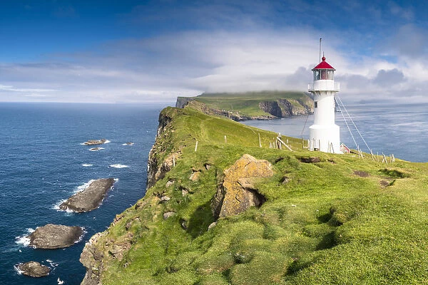 Mykines island, Faroe Islands, Denmark. Lighthouse and cliffs