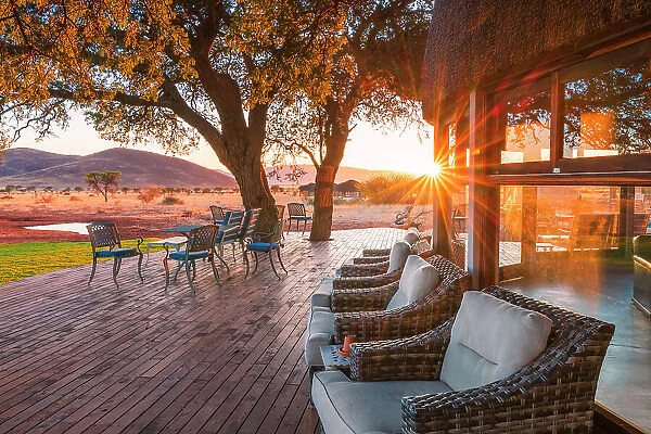Namibia, Namib Naukluft National Park, sofas on a deck in a game reserve safari lodge