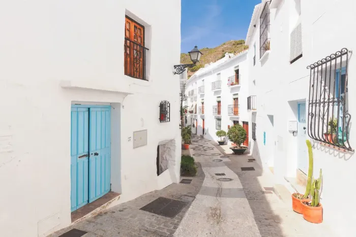 Framed Print : A narrow alley in Frigiliana, La Axarquia, Malaga province, Andalusia, Spain Framed Print : A narrow alley in Frigiliana, La Axarquia, Malaga province, Andalusia, Spain