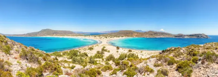 Framed Print : The narrow stretch of white sand which divides Simos beach viewed from a ridge Framed Print : The narrow stretch of white sand which divides Simos beach viewed from a ridge