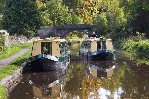Narrowboat cruising on the Monmouthshire and Brecon Canal, Llangattock, Brecon Beacons