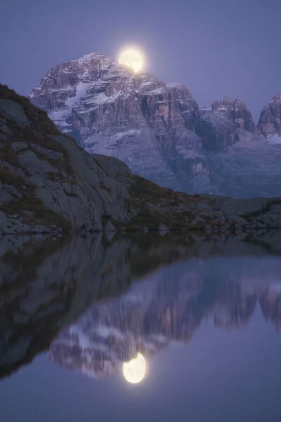 The nascent Moon on Cima Grost√®Mountain