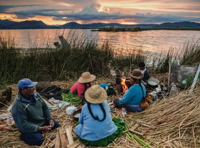 Framed Print : Native Uro Family dining at sunset, Uros Floating Islands, Lake Titicaca, Puno Region Framed Print : Native Uro Family dining at sunset, Uros Floating Islands, Lake Titicaca, Puno Region