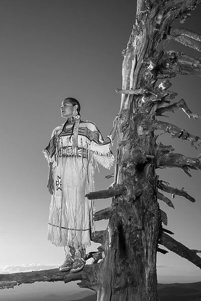 Native woman, Acosia M. Red Elk, in historic buckskin dress on top of Paulina Peak