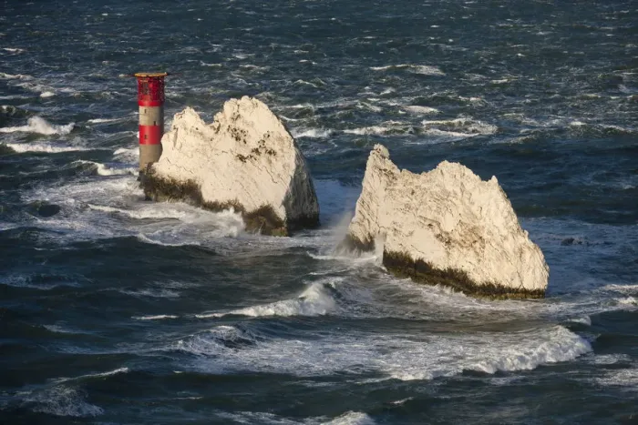 Framed Print : The Needles Lighthouse during stormy weather, Isle of Wight, England. Autumn Framed Print : The Needles Lighthouse during stormy weather, Isle of Wight, England. Autumn