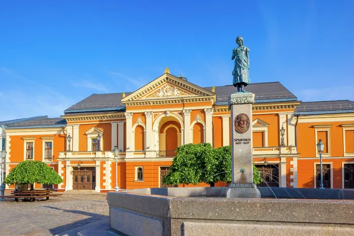 Framed Print : The Neoclassical Klaipeda Drama Theatre with the Annie from Tharau Statue, Klaipeda, Lithuania Framed Print : The Neoclassical Klaipeda Drama Theatre with the Annie from Tharau Statue, Klaipeda, Lithuania