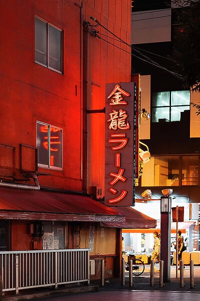 Neon lights in the streets of Osaka by night, Japan