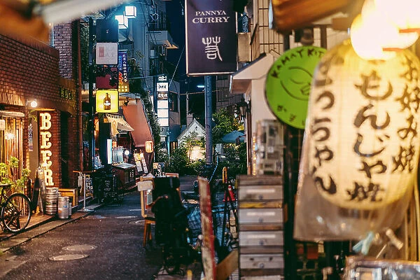 Neon and signs on the streets of Shimokitazawa in the evening, Tokyo, Japan