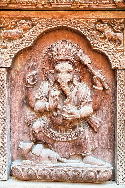 Nepalese Wooden Carving with Hindu God Ganesha (The Elephant God), Royal Palace in Patan, Kathmandu valley, Nepal, Asia