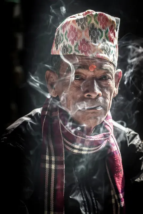 Framed Print : Nepali man smoking, Bhaktapur, Kathmandu Valley, Nepal