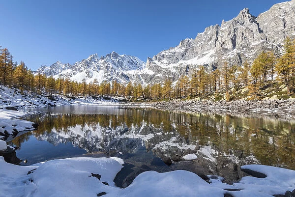 The Nero Lake in autumn after snowfall, Buscagna Valley, Alpe Devero