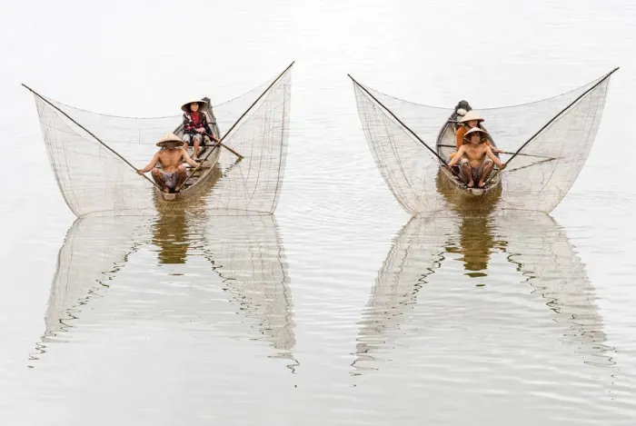 Framed Print : Net casting fishermen on the Perfume River, Hue, Vietnam Framed Print : Net casting fishermen on the Perfume River, Hue, Vietnam