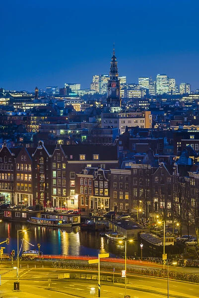 Netherlands, Amsterdam, elevated city skyline from the north, dusk