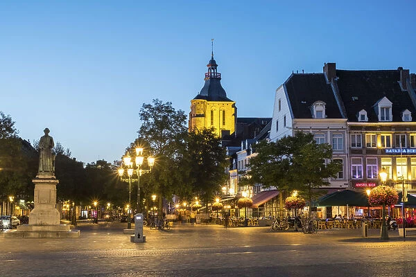 Netherlands, Limburg, Mstricht. Cafes and restaurants on Markt square at dusk