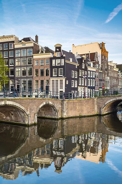 Netherlands, North Holland, Amsterdam. Canal houses at the intersection of Keizersgracht