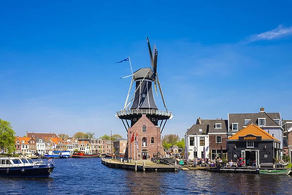 Netherlands, North Holland, Haarlem. Windmill De Adriaan on the Spaarne River