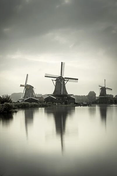 Netherlands, North Holland, Zaandam, Zaanse Schans, left to right The Seeker (De Zoeker) Oilmill