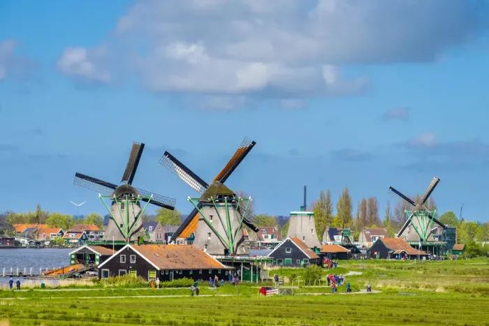 Framed Print : Netherlands, North Holland, Zaandam. Historic windmills and houses in the village Framed Print : Netherlands, North Holland, Zaandam. Historic windmills and houses in the village