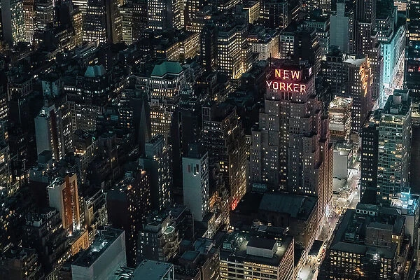 New York Skyline at night, the New Yorker sign, New York City, USA