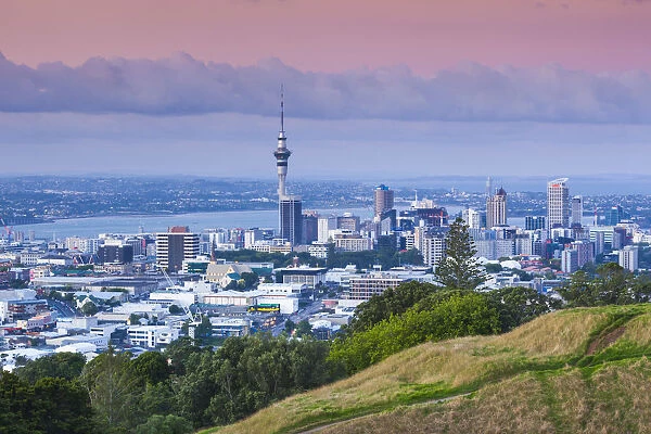 New Zealand, North Island, Auckland, elevated skyline from Mt. Eden volcano cone, dusk