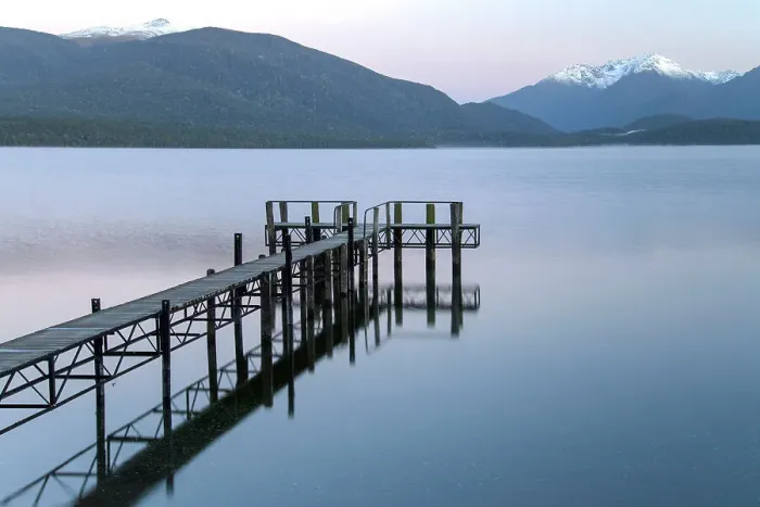 Framed Print : New Zealand, South Island, Southland, Southern alps, Te Anau, Lake Te Anau, pier and mountains