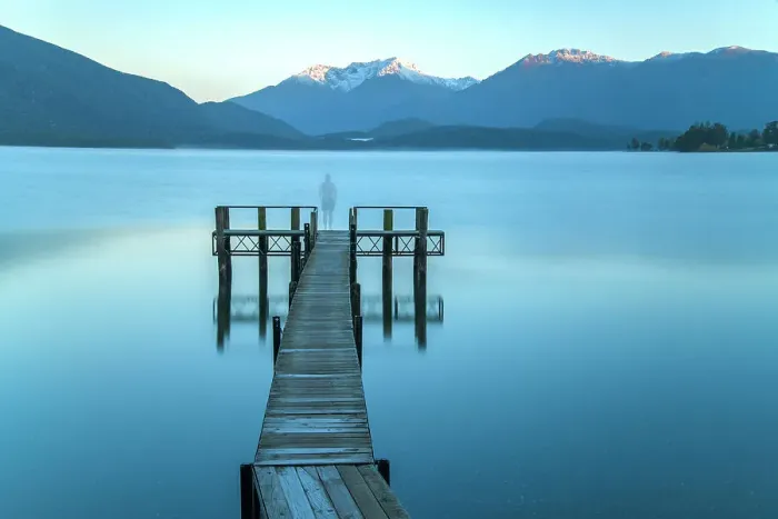 Framed Print : New Zealand, South Island, Southland, Southern alps, Te Anau, Lake Te Anau, man on pier