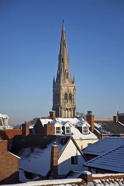 Newark, UK. The Church of St Mary Magdalene rises above Newarks eclectic roofscape