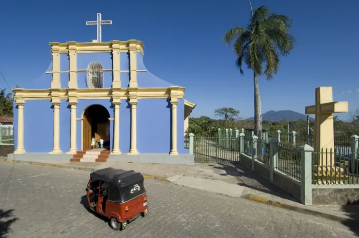 Framed Print : Nicaragua, San Juan de Oriente, Pueblo Blanco, Church, Mombacho Volcano, Three Wheeled Framed Print : Nicaragua, San Juan de Oriente, Pueblo Blanco, Church, Mombacho Volcano, Three Wheeled