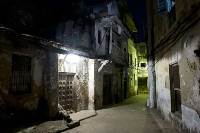 Framed Print : Night time Street scene in Stone Town, Unguja Island, Zanzibar archipelago, Tanzania Framed Print : Night time Street scene in Stone Town, Unguja Island, Zanzibar archipelago, Tanzania