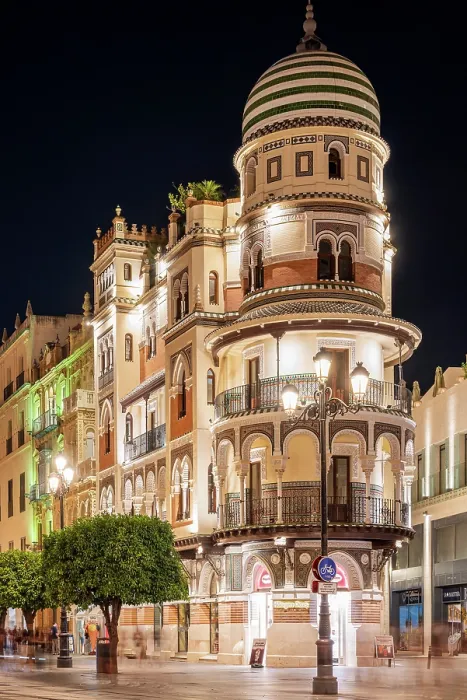 Framed Print : Night view of Edificio La Adriatica, Avenida de la Constitucion, Seville, Andalusia, Spain Framed Print : Night view of Edificio La Adriatica, Avenida de la Constitucion, Seville, Andalusia, Spain
