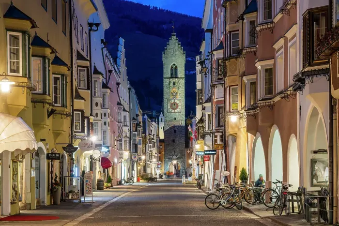 Framed Print : Night view of the main street with Zwolferturm medieval tower in the background, Sterzing-Vipiteno, Trentino-Alto Adige / Sudtirol, Italy Framed Print : Night view of the main street with Zwolferturm medieval tower in the background, Sterzing-Vipiteno, Trentino-Alto Adige / Sudtirol, Italy