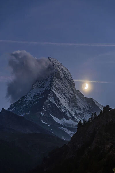Night view of Matterhorn with crescent moon, Zermatt, Valais, Switzerland