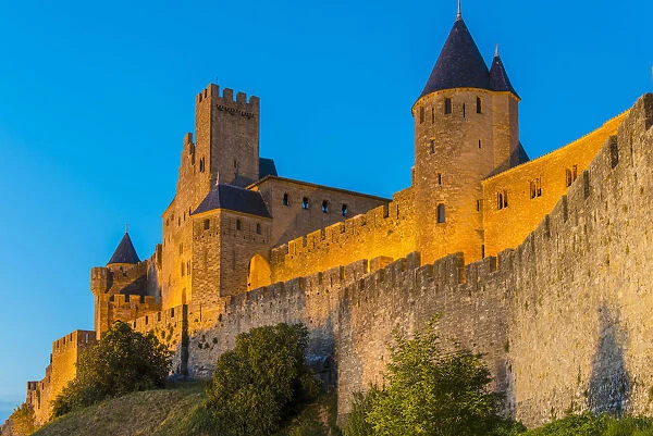 Night view of the medieval fortified city with Chateau Comtal, Carcassonne