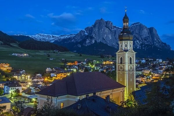 Night view over the mountain village of Castelrotto Kastelruth, Alto Adige or South Tyrol
