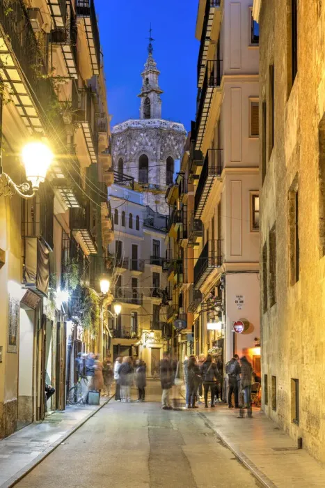 Framed Print : Night view of an old towns street with Miguelete Tower in the background, Valencia, Spain Framed Print : Night view of an old towns street with Miguelete Tower in the background, Valencia, Spain