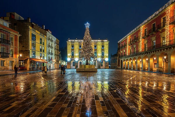 Night view of Plaza Mayor decorated with Christmas lights, Gijon, Asturias, Spain