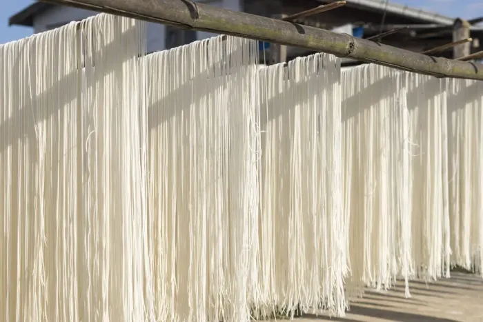 Framed Print : Noodles drying from bamboo under sunlight, Hsipaw, Hsipaw Township, Kyaukme District Framed Print : Noodles drying from bamboo under sunlight, Hsipaw, Hsipaw Township, Kyaukme District
