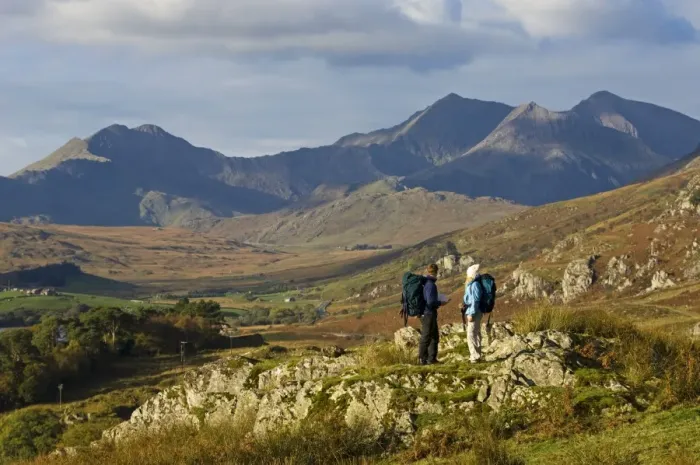 Framed Print : North Wales, Snowdonia. A man and woman stop to look at their map whilst hiking in Snowdonia Framed Print : North Wales, Snowdonia. A man and woman stop to look at their map whilst hiking in Snowdonia