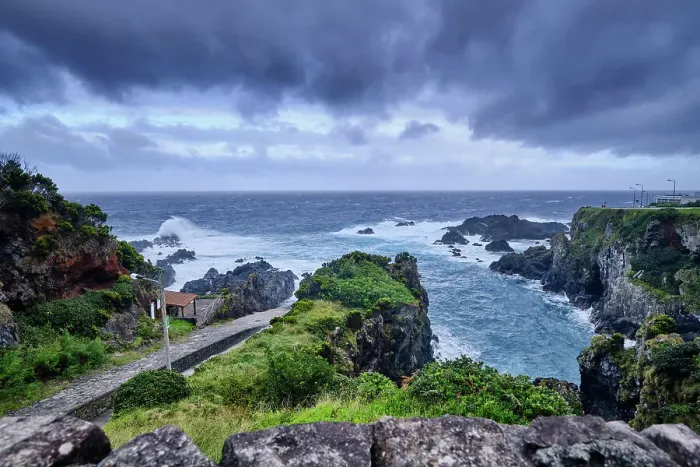 Framed Print : The northeast coast of Flores island, at Boqueirao, on a stormy day. The ramp to pull the sperm whales on the left, by the sea. Azores islands, Portugal Framed Print : The northeast coast of Flores island, at Boqueirao, on a stormy day. The ramp to pull the sperm whales on the left, by the sea. Azores islands, Portugal