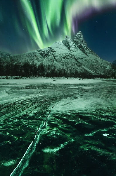 Northern lights over Mount Otertinden in the Tromso region, Norway