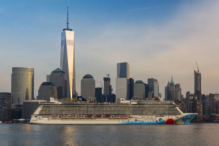 Framed Print : Norwegian Cruise Line ship passing through Hudson River with Lower Manhattan financial