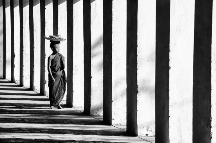 Framed Print : Novice Buddhist monk on the way to lunch, Mandalay, Burma / Myanmar Framed Print : Novice Buddhist monk on the way to lunch, Mandalay, Burma / Myanmar