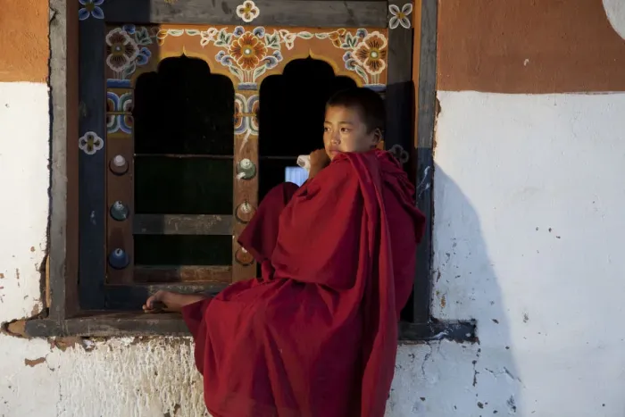 Framed Print : A novice monk near Wangdue Phodrang in Bhutan Framed Print : A novice monk near Wangdue Phodrang in Bhutan