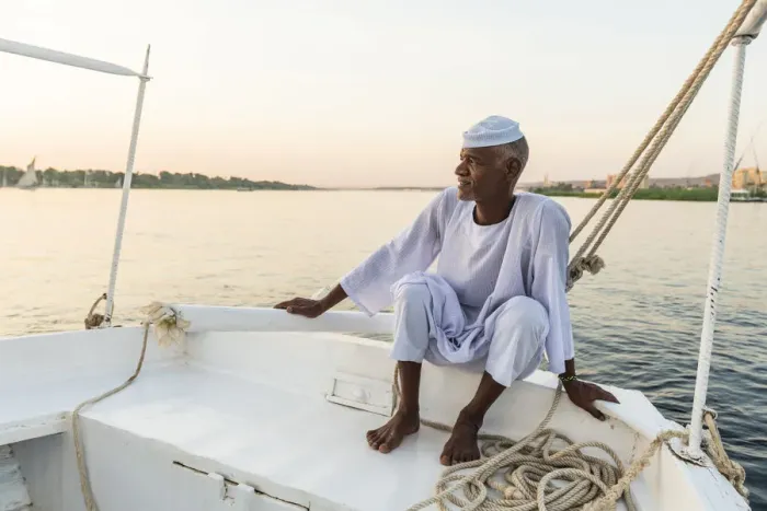 Framed Print : Nubian sailor on his felucca boat on the Nile River, Aswan, Upper Egypt, Egypt, Africa Framed Print : Nubian sailor on his felucca boat on the Nile River, Aswan, Upper Egypt, Egypt, Africa