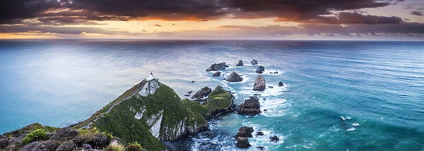 Nugget Point Lighthouse at Sunrise, New Zealand