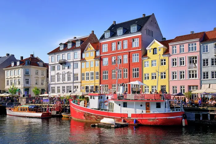 Framed Print : Nyhavn, or New Harbour, is a 17th-century waterfront, canal and entertainment district, full of restaurants and bars, in Copenhagen, Denmark Framed Print : Nyhavn, or New Harbour, is a 17th-century waterfront, canal and entertainment district, full of restaurants and bars, in Copenhagen, Denmark