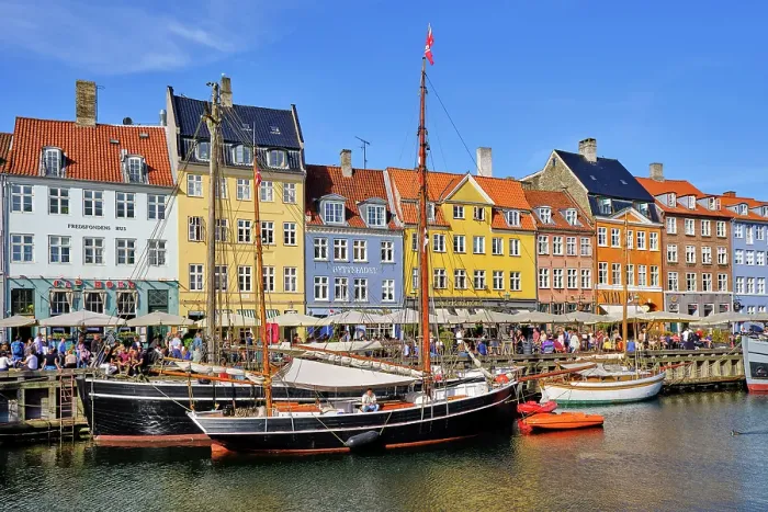 Framed Print : Nyhavn, or New Harbour, is a 17th-century waterfront, canal and entertainment district, full of restaurants and bars, in Copenhagen, Denmark Framed Print : Nyhavn, or New Harbour, is a 17th-century waterfront, canal and entertainment district, full of restaurants and bars, in Copenhagen, Denmark