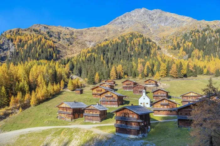 Framed Print : Oberstaller alm, alpine pasture with wooden huts and the Schutzengelkapelle in the middle Framed Print : Oberstaller alm, alpine pasture with wooden huts and the Schutzengelkapelle in the middle